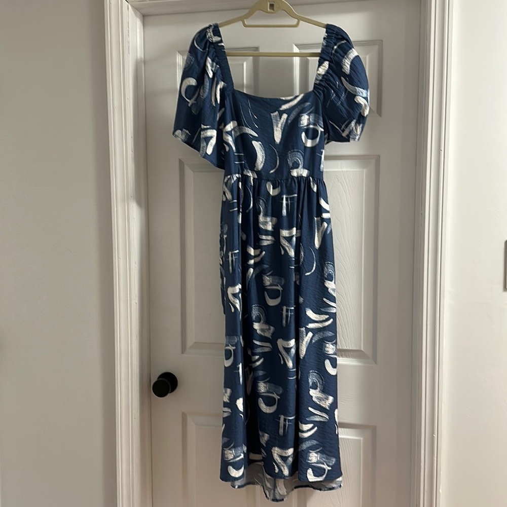 Blue & white maxi dress with short sleeves and cut out back